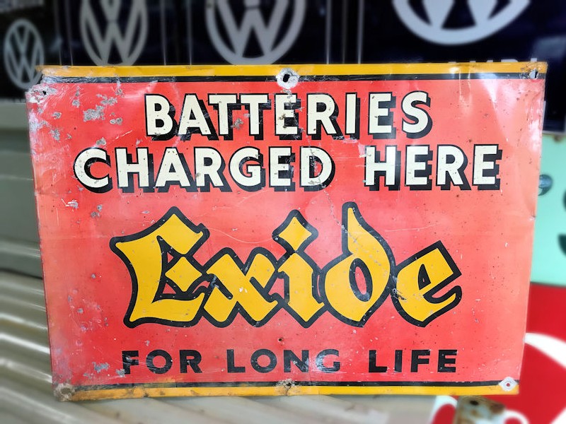 Exide batteries charged here for long life painted tin sign