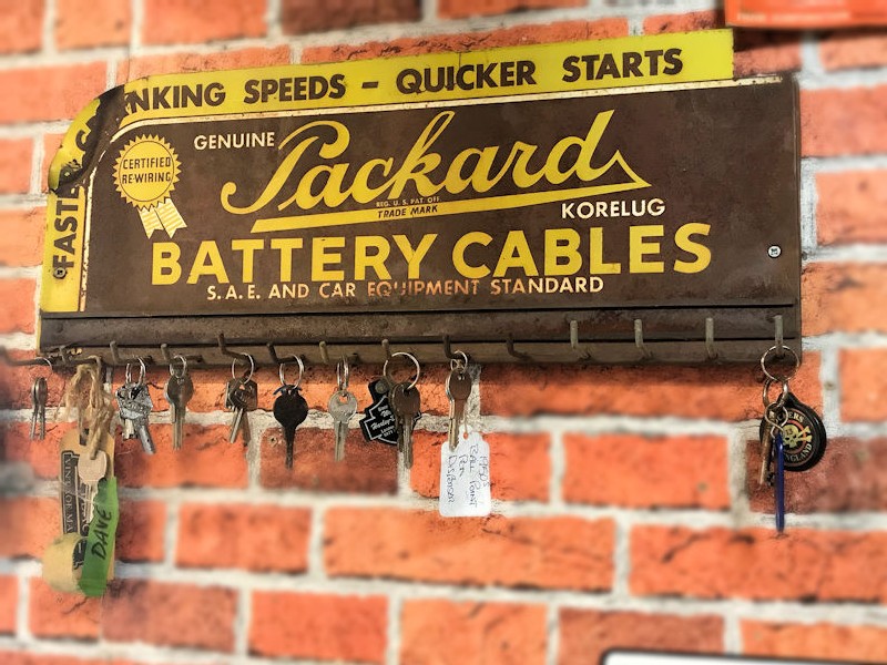 Original Packard battery painted tin cables rack