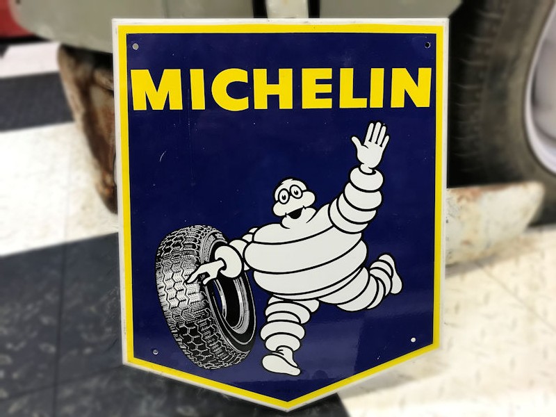 Original 1970s new old stock painted tin Michelin sign