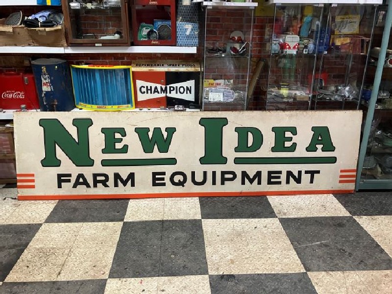 Large New Idea farm equipment metal sign