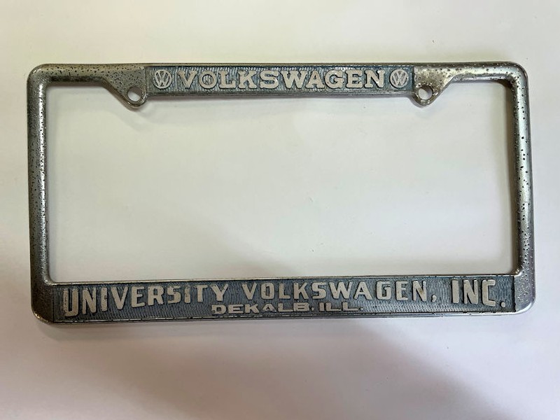 Original vintage University Volkswagen Inc VW license plate surround